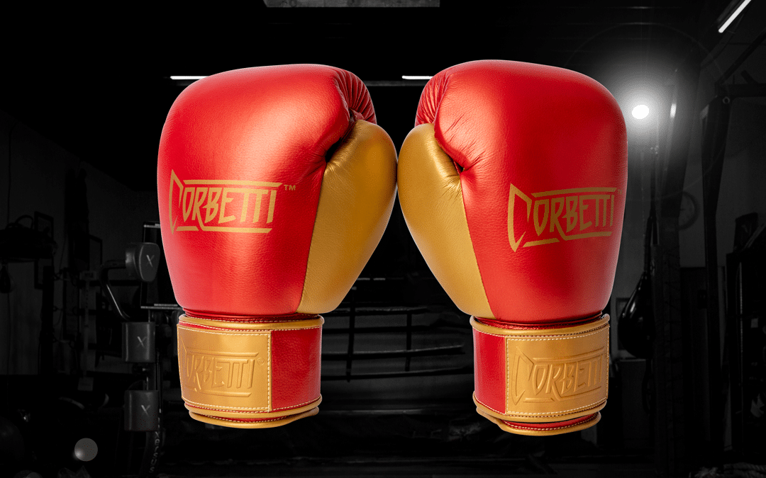 Corbetti Muay Thai Gloves in Cooper Red Color side by side showing metallic gold thumbs