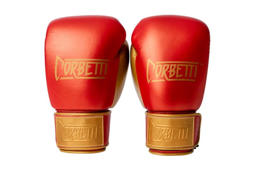 Corbetti CTG-002 Copper-Gold Muay Thai Gloves both standing up fist side forward highlighting the brand's logo