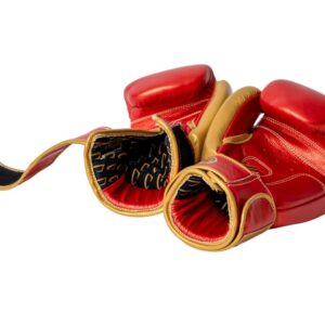 Corbetti CTG-002 Copper-Gold Muay Thai Gloves both laying on fist side with a view to the inside printed liner