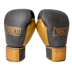 Corbetti CTG-006 Vintage-Gold Muay Thai Gloves both standing up at and angle, fist side forward, to showcase the metallic gold thumbs and brand's logos