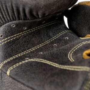 Corbetti CTG-006 Vintage-Gold Muay Thai Glove detail view of the palm breathing holes and kevlar thread stitching work