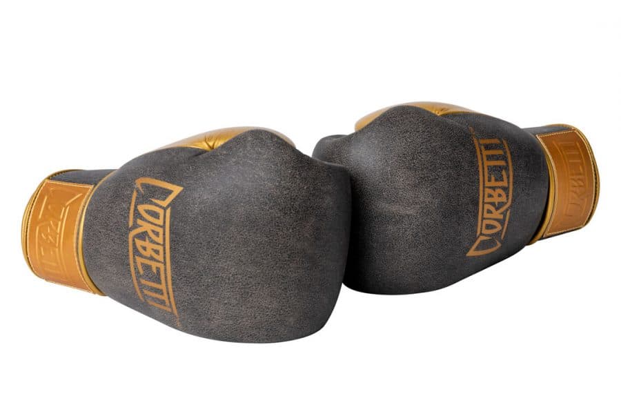 Corbetti CTG-006 Vintage-Gold Muay Thai Gloves left and right laying side by side touching fists showcasing the brand logos