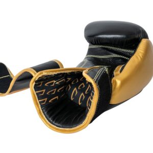 Corbetti CTG-001 Black-Gold Muay Thai Glove laying on fist side with palm up view of the inside of the glove showcasing the printed liner