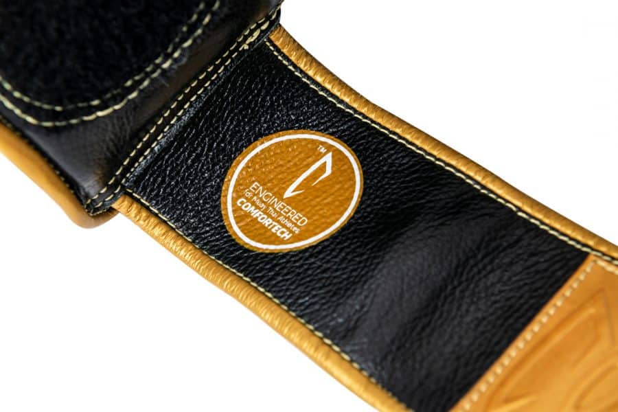 Corbetti CTG-001 Black-Gold Muay Thai Glove wrist strap highlighting the leather grain and comfortech technology label
