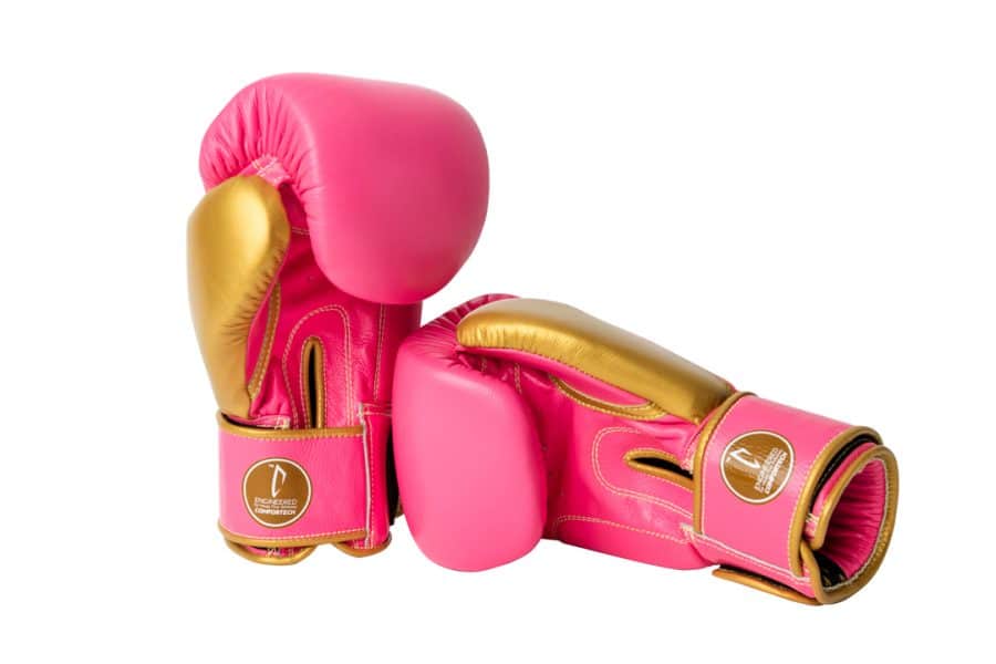Corbetti CTG-004 Pink-Gold Muay Thai Gloves Left standing up and right on laying on its side palm side forward